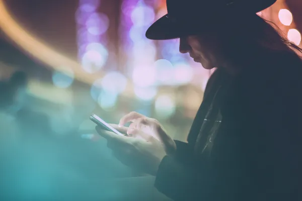 A woman in a luxurious green gown next to an ornate roulette wheel, capturing the upscale casino mood of SUPERJILI.