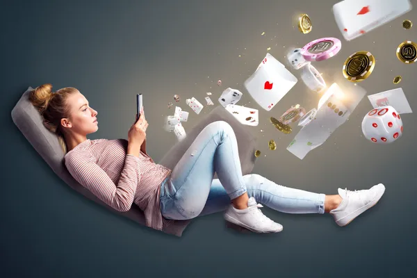 A player using their smartphone during a festive local event, representing SUPERJILI’s fully mobile-friendly casino.